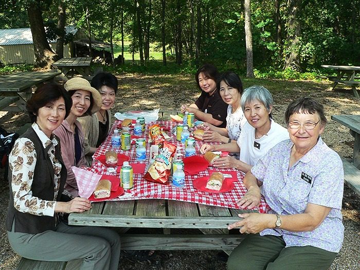 Tour group from Japan enjoying a picnic in Mansfield, MO.