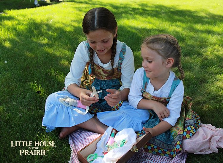 Making clothespin dolls with scraps of fabric and ribbon trim - Little House on the Prairie inspired crafts!