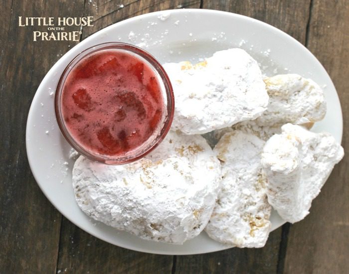 Sprinkle vanity cakes with powdered sugar and serve with strawberry sauce. 