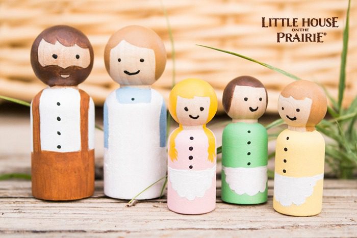 Finishing touches for your Little House on the Prairie inspired homemade wooden peg dolls. 