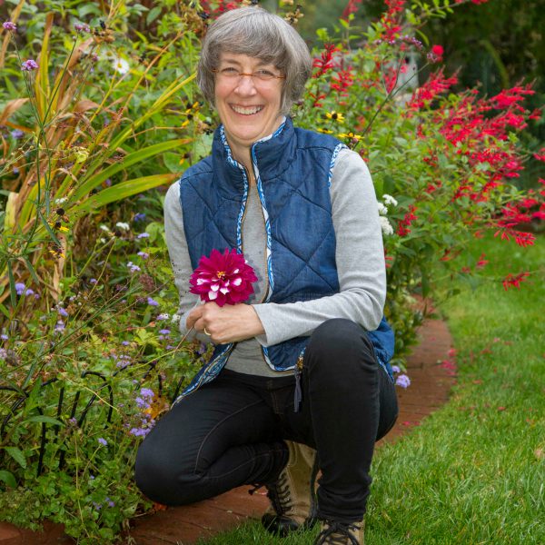 Marta in a garden inspired by Laura Ingalls Wilder
